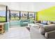 Light-filled living room offering views of the golf course beyond the window at 4534 La Jolla Dr, Bradenton, FL 34210