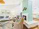 Bright living room offers ample seating, fireplace and stylish decor at 4534 La Jolla Dr, Bradenton, FL 34210