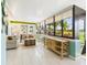 Bright living room features built-in shelving and views of the golf course at 4534 La Jolla Dr, Bradenton, FL 34210