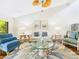 Bright living room with vaulted ceilings, stylish decor, and hardwood flooring at 4534 La Jolla Dr, Bradenton, FL 34210