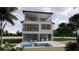 Modern three-story home with a swimming pool, patio area, and outdoor entertainment at 4903 Commonwealth Dr, Sarasota, FL 34242