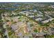 Expansive aerial view of a community with lakes and mature trees at 5020 Live Oak Cir, Bradenton, FL 34207