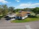 Aerial view of well-maintained property featuring lush lawns, mature trees, and cozy, well-kept homes at 5020 Live Oak Cir, Bradenton, FL 34207
