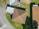 Aerial view of roof with nearby carport and small garden at 5020 Live Oak Cir, Bradenton, FL 34207