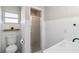 Clean bathroom featuring wainscoting, and a modern sink and vanity at 5020 Live Oak Cir, Bradenton, FL 34207