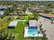 Aerial view of the community pool, shuffleboard and nearby parking at 5020 Live Oak Cir, Bradenton, FL 34207