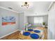 Inviting dining area flowing into a bright living space with hardwood floors at 5020 Live Oak Cir, Bradenton, FL 34207
