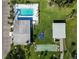 A beautiful swimming pool, shuffle board court, and lounging area at 5020 Live Oak Cir, Bradenton, FL 34207