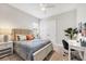 Bedroom with neutral walls, plush carpet, and double closet at 525 Maraviya Blvd, Nokomis, FL 34275