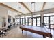 Billiard room with a bar, high ceilings, and natural light at 525 Maraviya Blvd, Nokomis, FL 34275