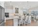 Bright kitchen with stainless appliances, granite countertops and pendant lighting at 525 Maraviya Blvd, Nokomis, FL 34275