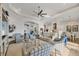 Open-concept living room flowing into the kitchen, with a large island and plenty of natural light at 525 Maraviya Blvd, Nokomis, FL 34275