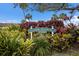 Entrance sign for Strathmore Riverside Villas, a 55+ community at 5571 Riverbluff Cir # V1, Sarasota, FL 34231