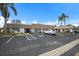 Well-maintained building exterior with convenient parking and accessible entrance at 5571 Riverbluff Cir # V1, Sarasota, FL 34231