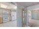 Bright kitchen with tile floors, wooden cabinetry, and modern appliances at 5571 Riverbluff Cir # V1, Sarasota, FL 34231