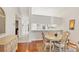 Comfortable dining area with views into the kitchen and adjacent living spaces at 5608 Country Club Way # 5608, Sarasota, FL 34243