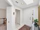 Welcoming foyer with tiled floors and a coat closet at 5608 Country Club Way # 5608, Sarasota, FL 34243