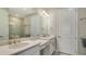 Bright bathroom featuring double vanity with ample counter space and modern fixtures at 6070 Mesa Gln, Bradenton, FL 34203