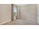 Neutral bedroom with a window bringing in plenty of natural light and plush carpeting at 6070 Mesa Gln, Bradenton, FL 34203
