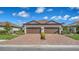 Beautiful home featuring a two-car garage and well-maintained landscaping at 6070 Mesa Gln, Bradenton, FL 34203