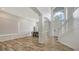 Open-concept design featuring soaring ceilings, modern floors, and tons of natural light at 6433 Blue Grosbeak Cir, Lakewood Ranch, FL 34202