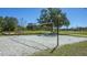 Community sand volleyball court with a net, perfect for recreational games and community events at 6433 Blue Grosbeak Cir, Lakewood Ranch, FL 34202