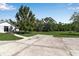 A long driveway leads up to this well-kept home and lush green yard at 6510 24Th E Ave, Bradenton, FL 34208