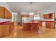 Well-lit kitchen with wooden cabinets, an island, and an open layout, perfect for cooking and entertaining at 6510 24Th E Ave, Bradenton, FL 34208