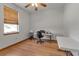 Office with wood floors and a window, desk, and a folding table at 6510 24Th E Ave, Bradenton, FL 34208