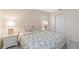 Cozy bedroom features a starfish patterned bedspread and neutral decor at 6812 19Th W Ave, Bradenton, FL 34209