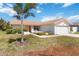 Charming single-story home featuring a well-maintained yard, lush landscaping, and a two-car garage, adding curb appeal at 6812 19Th W Ave, Bradenton, FL 34209