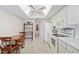 Airy eat-in kitchen features updated appliances and a tile floor at 6812 19Th W Ave, Bradenton, FL 34209