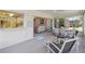 Comfortable sunroom with easy access to the living area, perfect for relaxation and entertaining at 6812 19Th W Ave, Bradenton, FL 34209