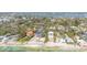 Coastal home, providing ocean views and nearby beach access, set among lush foliage and neighborhood charm at 7324 Point Of Rocks Rd, Sarasota, FL 34242
