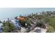 New construction modern house with nearby beach access and beautiful green landscaping at 7324 Point Of Rocks Rd, Sarasota, FL 34242