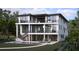 Elegant modern home featuring a beautiful backyard with a private pool at 7324 Point Of Rocks Rd, Sarasota, FL 34242
