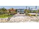 Modern beachfront home showcases its architectural design and beachfront location, offering coastal living at 7324 Point Of Rocks Rd, Sarasota, FL 34242