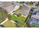 Backyard features mature landscaping and white fencing at 7583 Aguila Dr, Sarasota, FL 34240