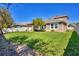 Expansive backyard featuring well-maintained lawn and white vinyl fencing at 7583 Aguila Dr, Sarasota, FL 34240