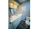 Bathroom featuring a white vanity with a mirror, and a toilet at 105 47Th Avenue W Dr # 377, Bradenton, FL 34207