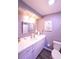 Bathroom featuring a white vanity with a mirror, and a toilet at 105 47Th Avenue W Dr # 377, Bradenton, FL 34207