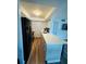 Well-equipped kitchen featuring white countertops, a black refrigerator, and streamlined cabinetry at 105 47Th Avenue W Dr # 377, Bradenton, FL 34207