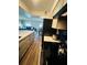 Charming kitchen design featuring modern appliances and a seamless flow to the adjacent living space at 105 47Th Avenue W Dr # 377, Bradenton, FL 34207