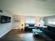 Cozy living room with plush seating, bright windows, and contemporary decor for a relaxed atmosphere at 105 47Th Avenue W Dr # 377, Bradenton, FL 34207