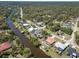 This neighborhood with canal access features mature trees, lush landscaping and beautiful homes at 108 Mccabe St, Port Charlotte, FL 33953