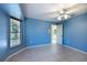 Bright bedroom with a bay window and tile floors, offering a serene space at 108 Mccabe St, Port Charlotte, FL 33953
