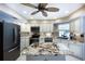 Beautiful kitchen features a center island, stainless steel appliances, and ample counter space at 108 Mccabe St, Port Charlotte, FL 33953