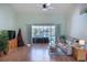 Inviting living room with sliding glass doors to lanai and pool, creating a seamless indoor-outdoor living experience at 108 Mccabe St, Port Charlotte, FL 33953