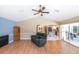 Open-concept living room flows into the kitchen with a comfortable seating area at 108 Mccabe St, Port Charlotte, FL 33953