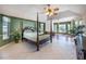 Spacious main bedroom with unique ceiling fan, large windows and plenty of living space at 108 Mccabe St, Port Charlotte, FL 33953